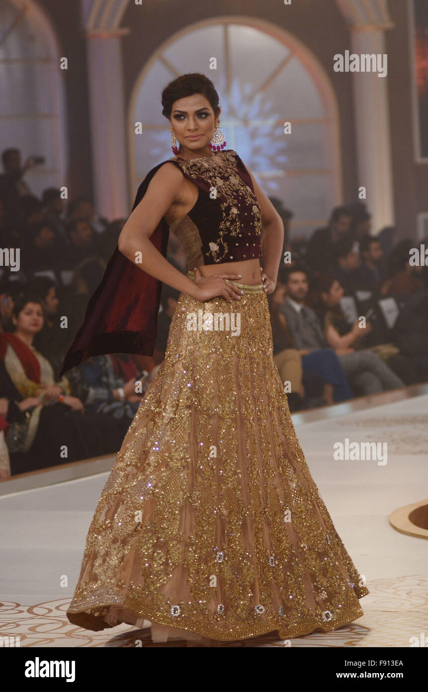 Lahore, Pakistan. 12th Dec, 2015. Pakistani model presents creations of ...
