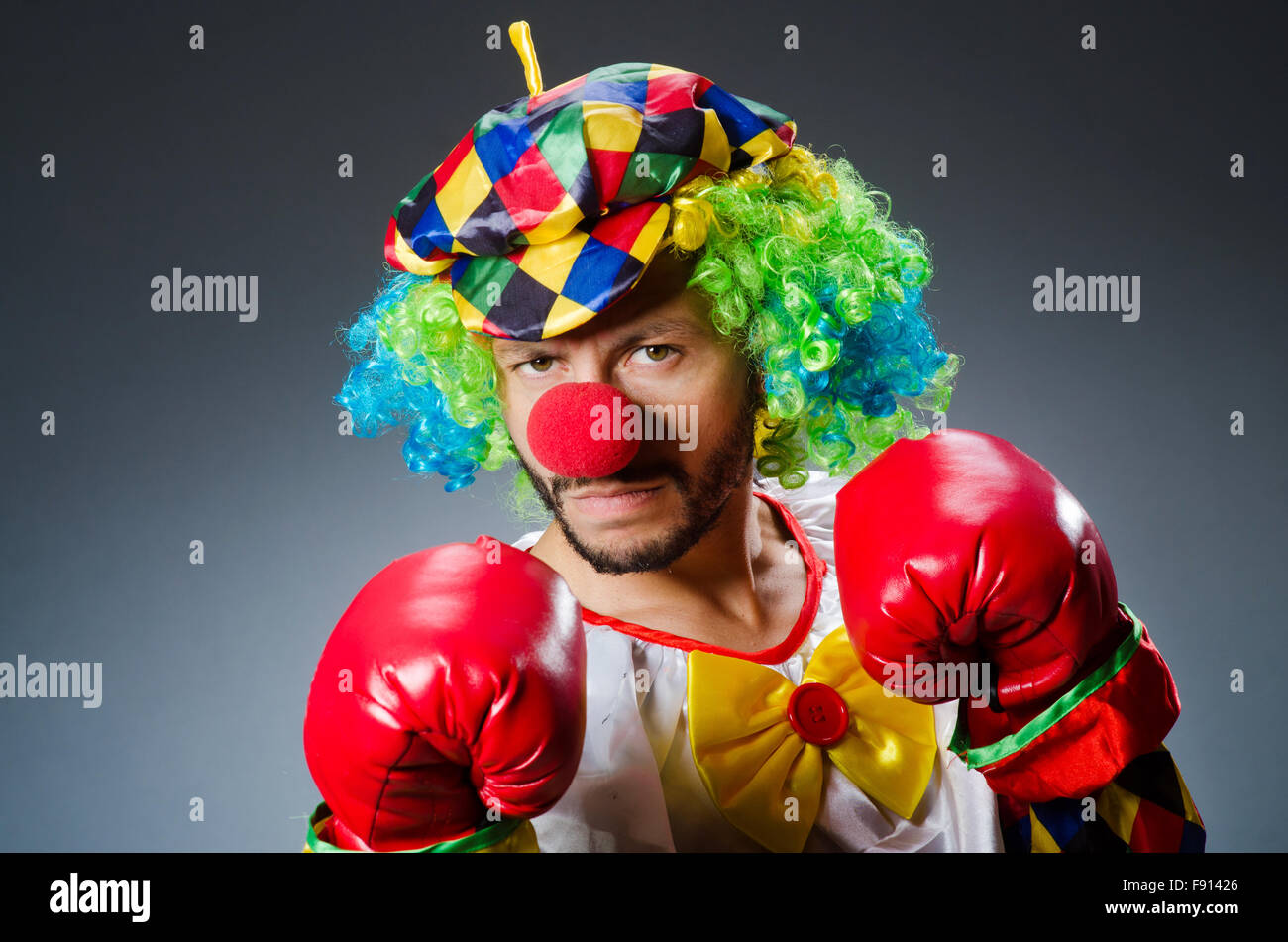 Funny clown with boxing gloves Stock Photo - Alamy