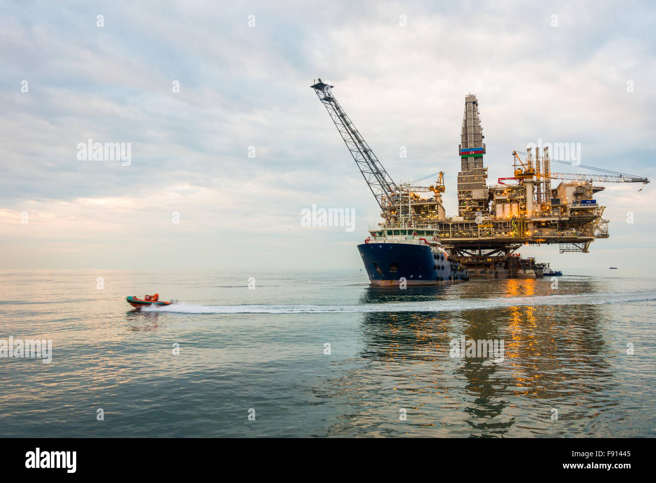 Oil rig platform in the calm sea Stock Photo - Alamy