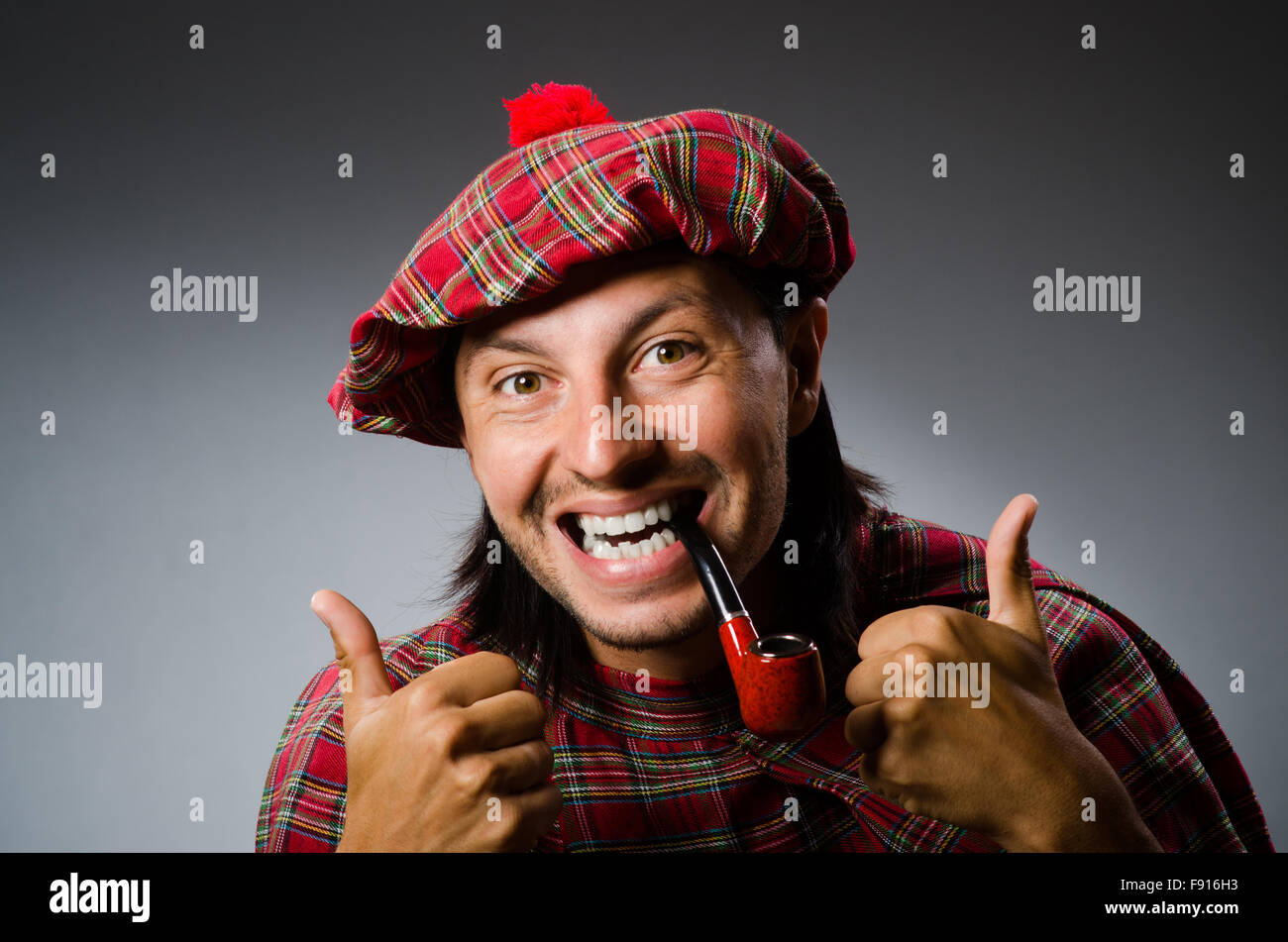 Funny scotsman with smoking pipe Stock Photo Alamy
