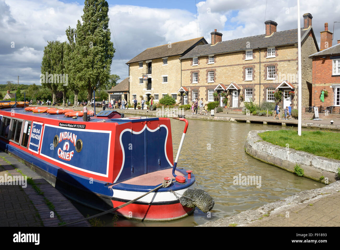 Cruise canal boat on Grand Union Canal, Stoke Bruerne, Northamptonshire, England, United Kingdom Stock Photo