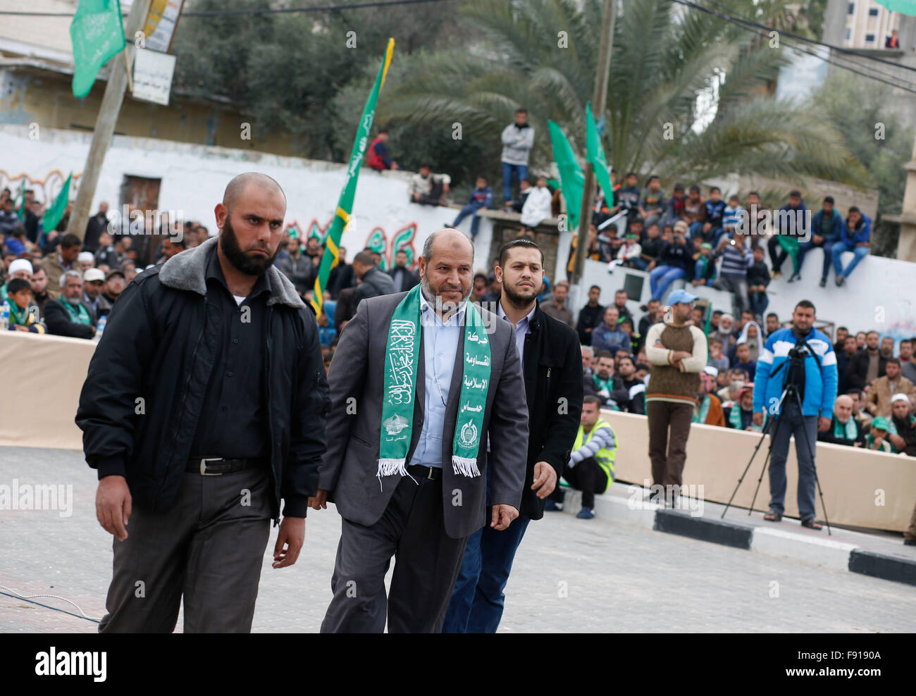 Gaza, Palestine. 11th Dec, 2015. Hamas leaders joins in the anniversary celebration. Thousands of Hamas supporters in the city of Khan Younis gather to celebrate the 28th anniversary of its existence. © Ramadan El-Agha/Pacific Press/Alamy Live News Stock Photo