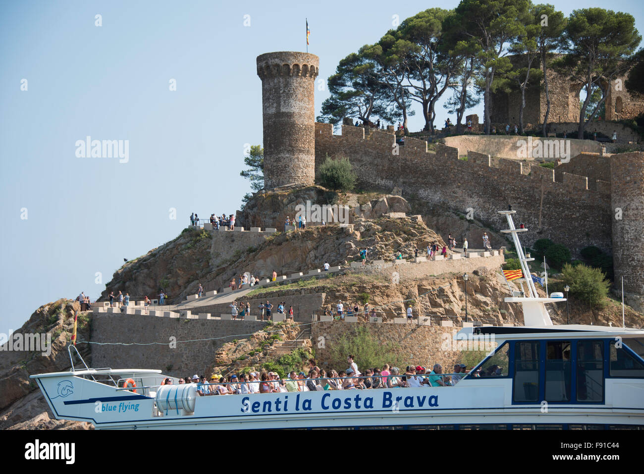 Excursion boat showing Vila Vella enceinte, Platja Gran, Tossa de Mar