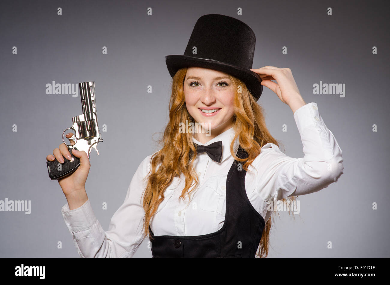 Pretty girl wearing retro hat isolated on gray Stock Photo - Alamy