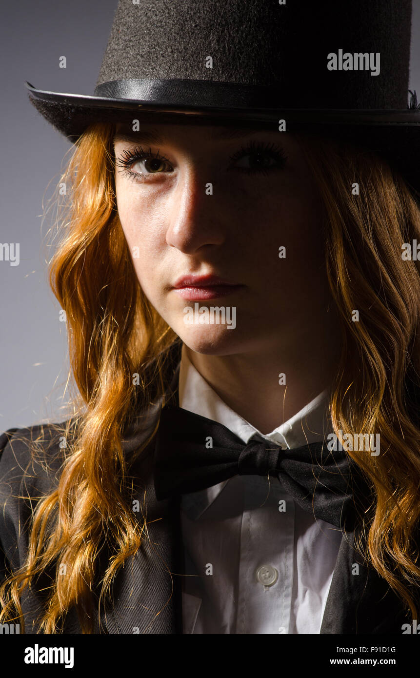 Pretty girl wearing retro hat isolated on gray Stock Photo - Alamy