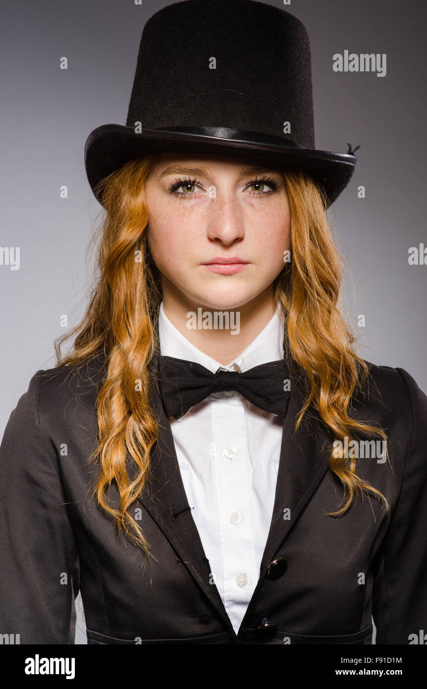 Pretty girl wearing retro hat isolated on gray Stock Photo - Alamy