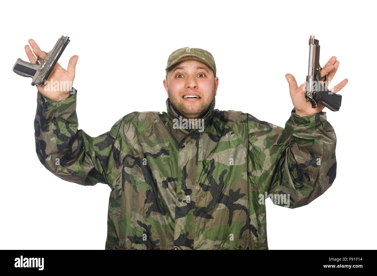 Young man in soldier uniform holding gun isolated on white Stock Photo ...