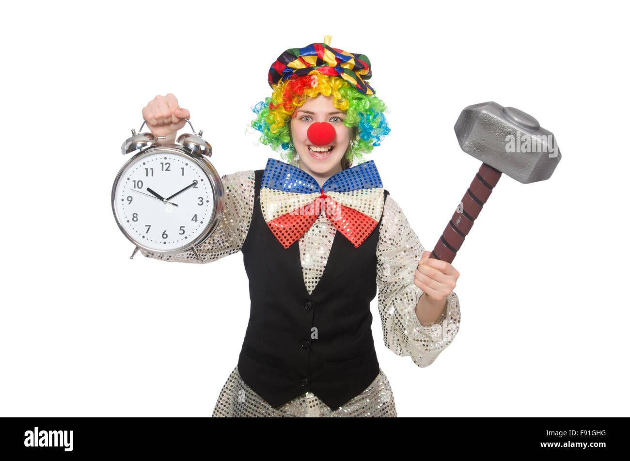 Female clown with alarmclock and hammer isolated on white Stock Photo