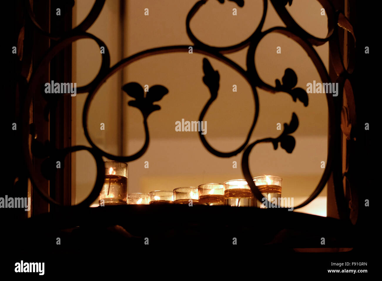 Hanukkah Candles lighting in a window of a Jewish home at the Jewish