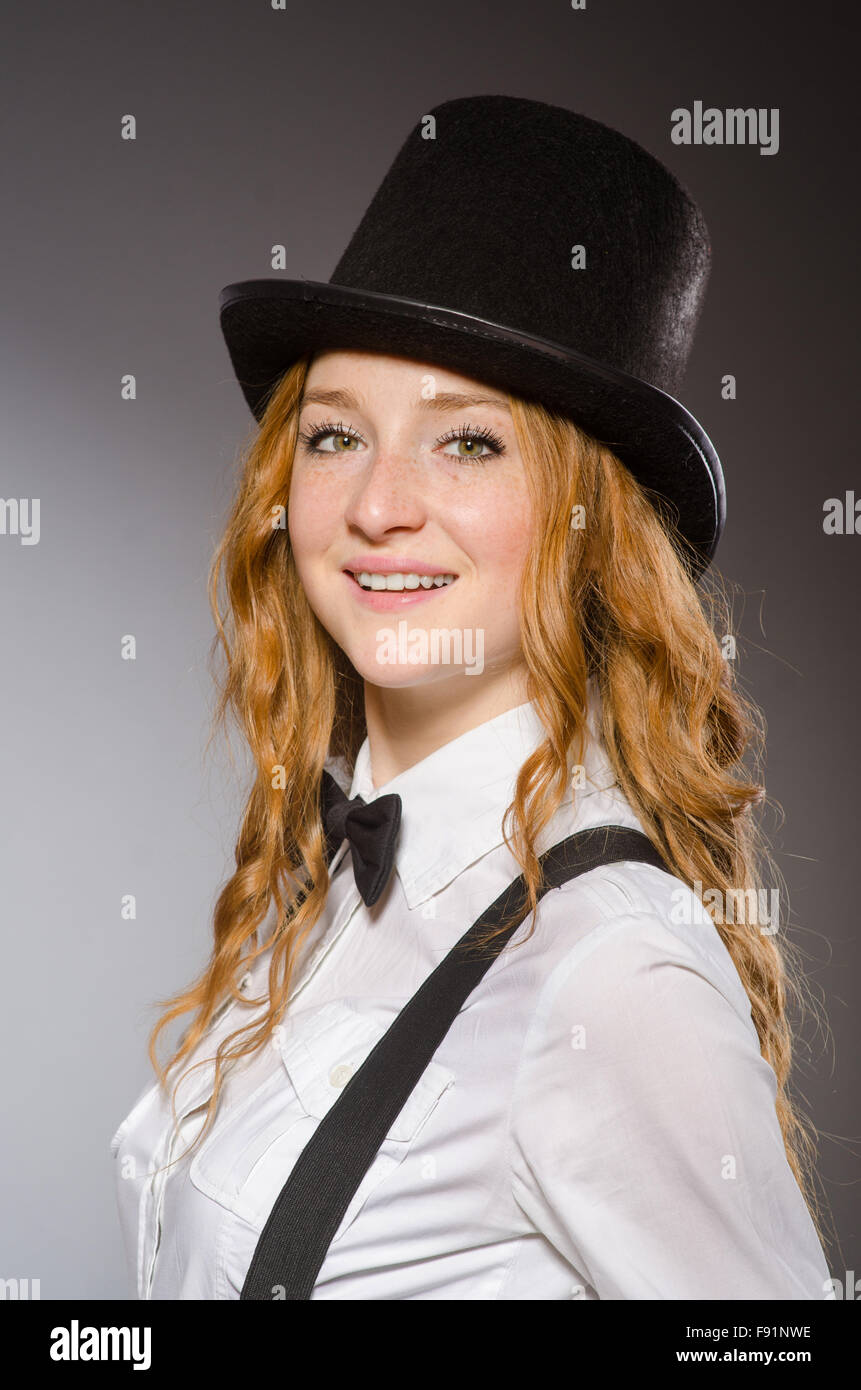 Pretty girl wearing retro hat isolated on gray Stock Photo - Alamy