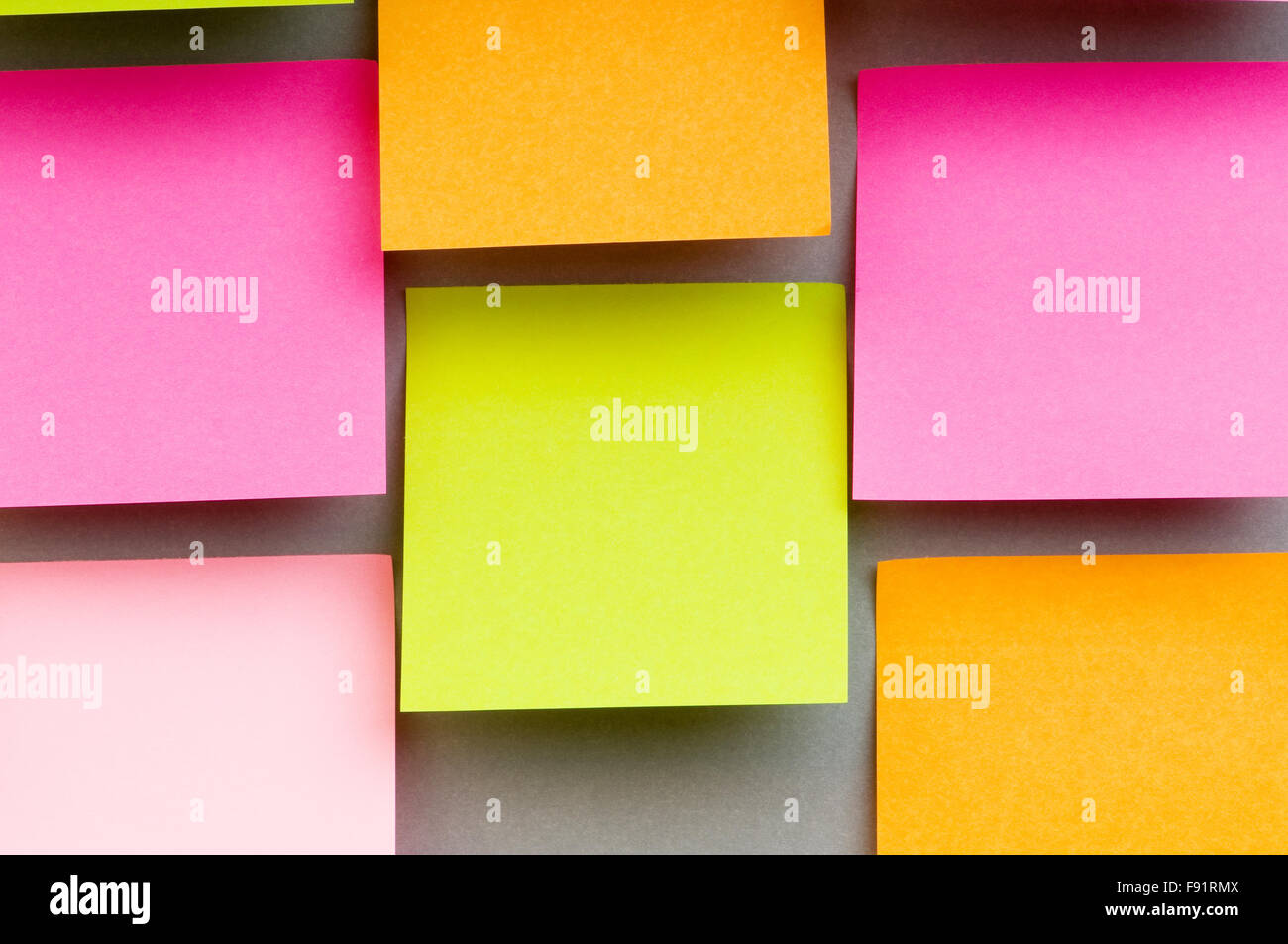 Reminder notes on the bright colorful paper Stock Photo - Alamy