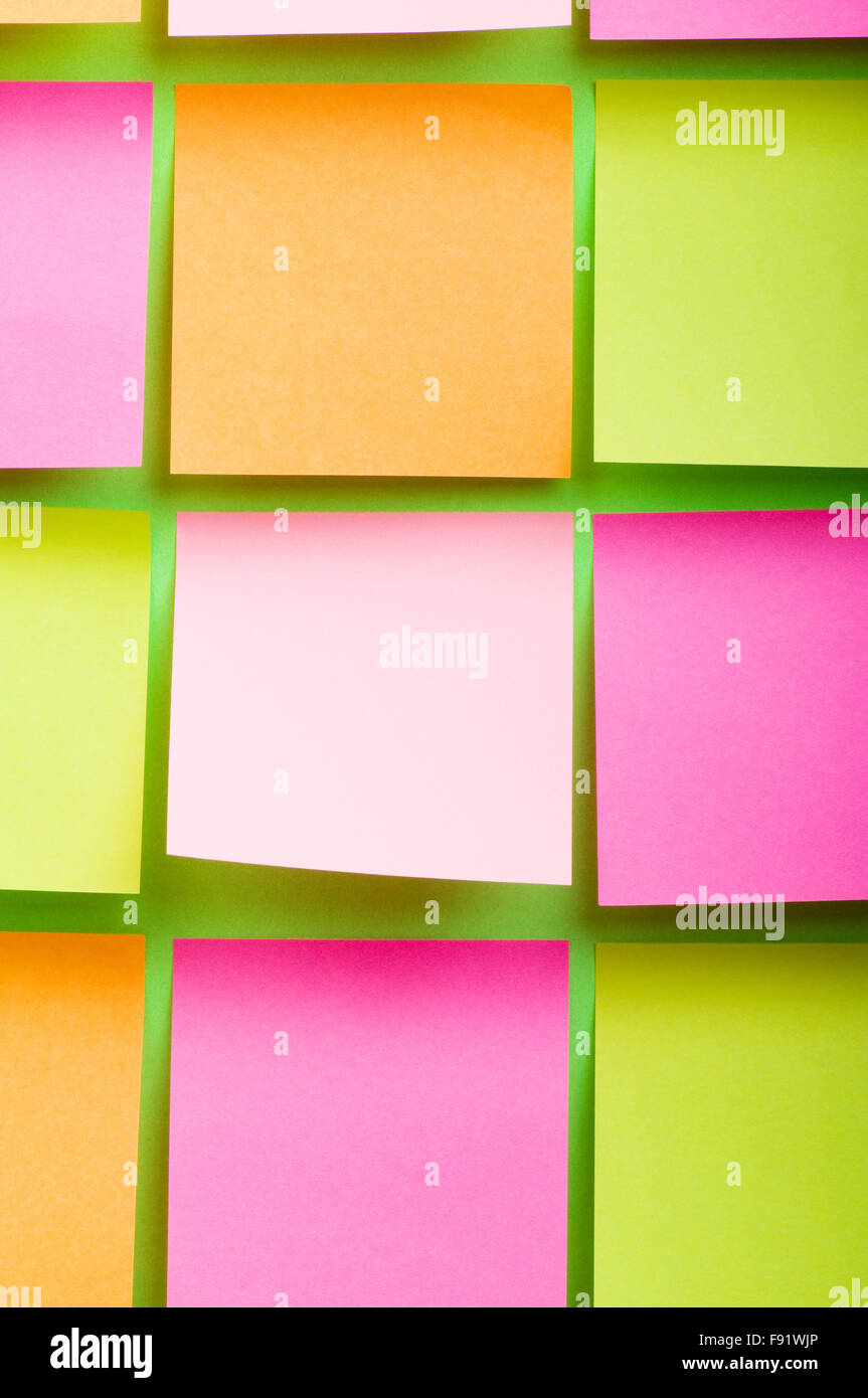 Reminder notes on the bright colorful paper Stock Photo - Alamy