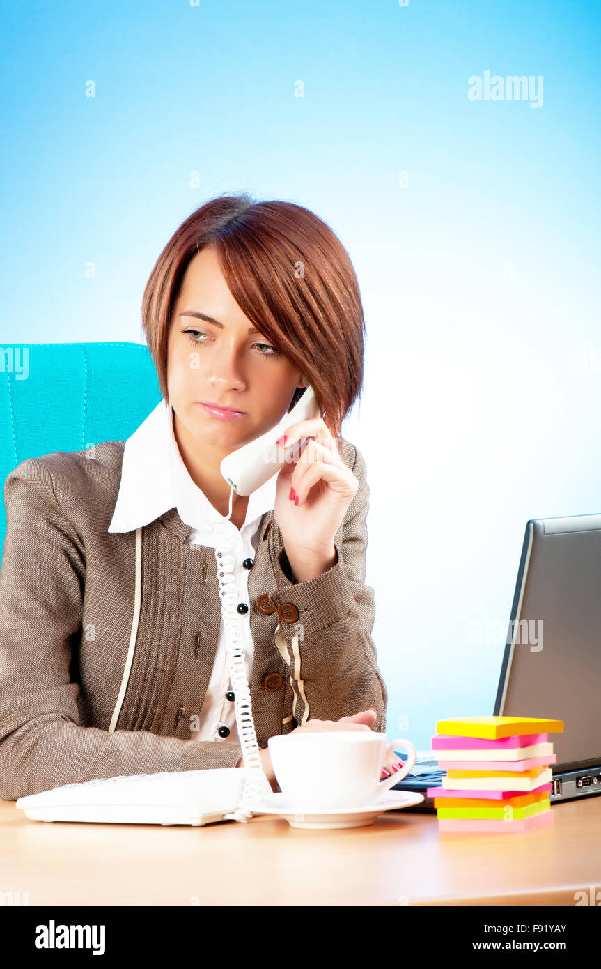 Young business woman working in the office Stock Photo - Alamy