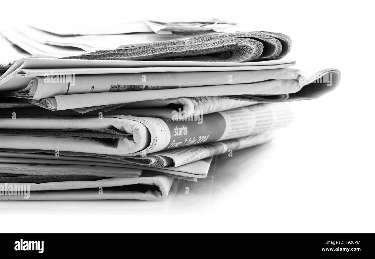 Various newspapers over white background Stock Photo