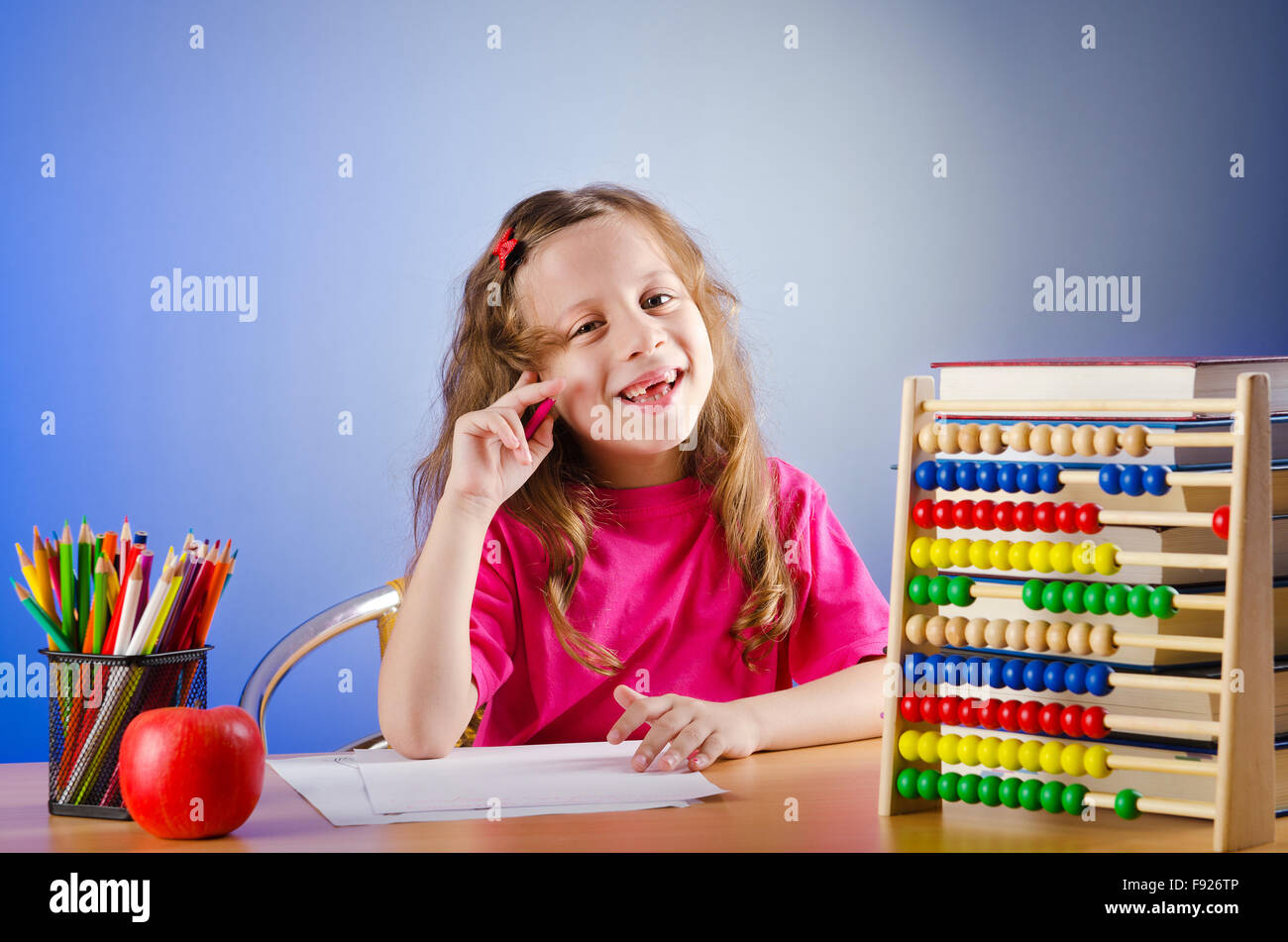 Little girl drawing with pencils Stock Photo - Alamy