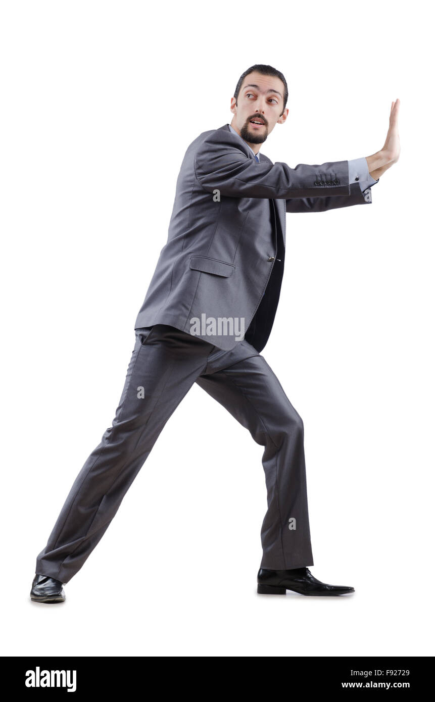 Businessman pushing away virtual obstacles Stock Photo - Alamy