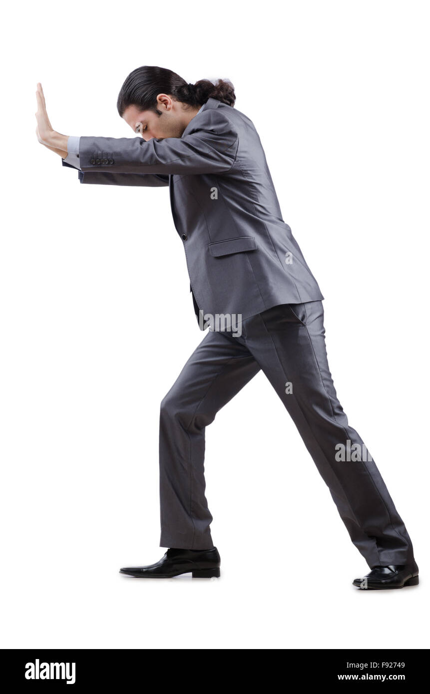 Businessman pushing away virtual obstacles Stock Photo - Alamy