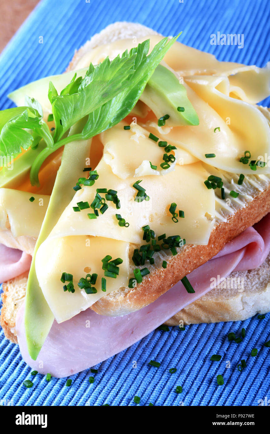 Ham and cheese sandwich with avocado and chives Stock Photo Alamy