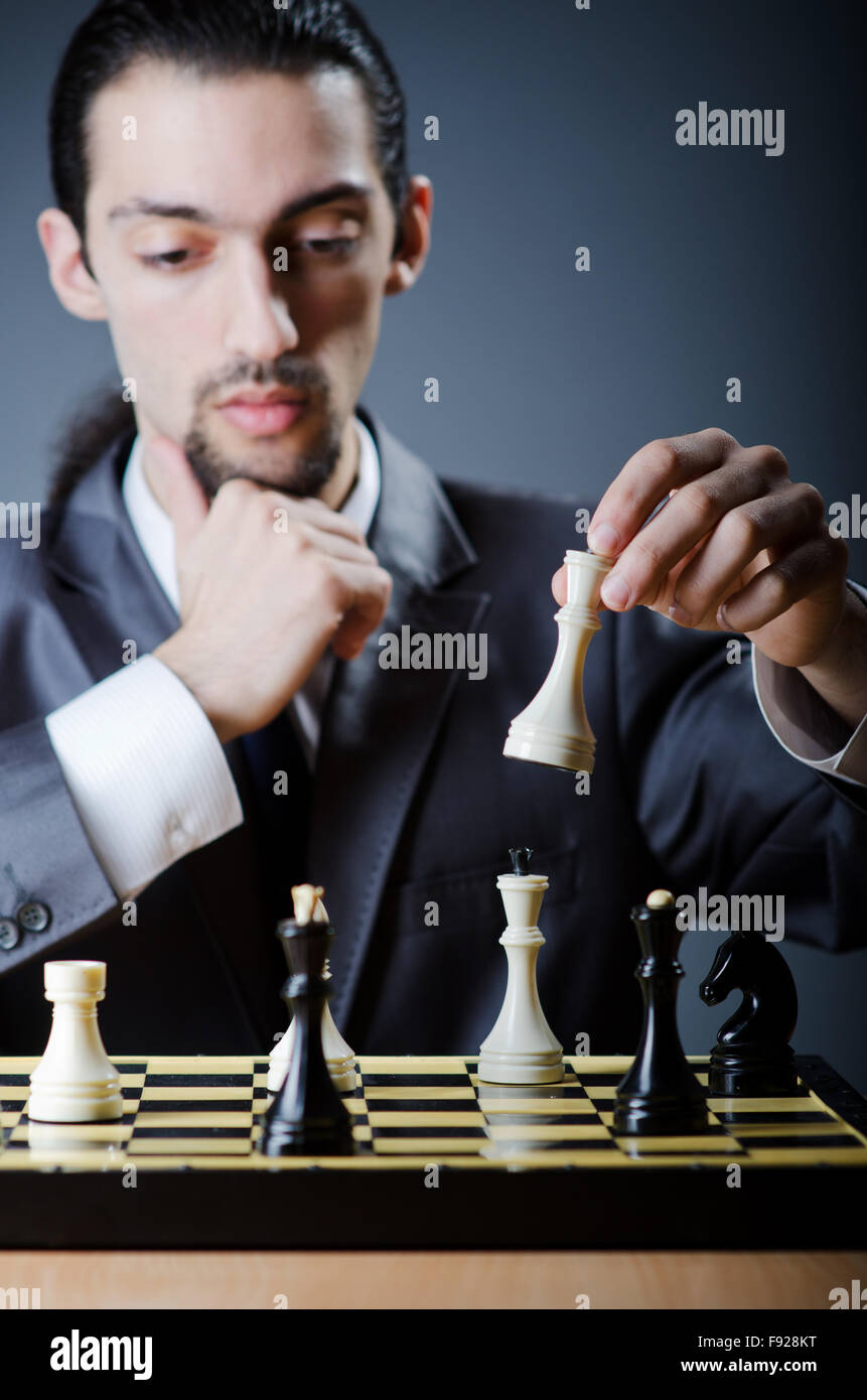 Chess player playing his game Stock Photo - Alamy