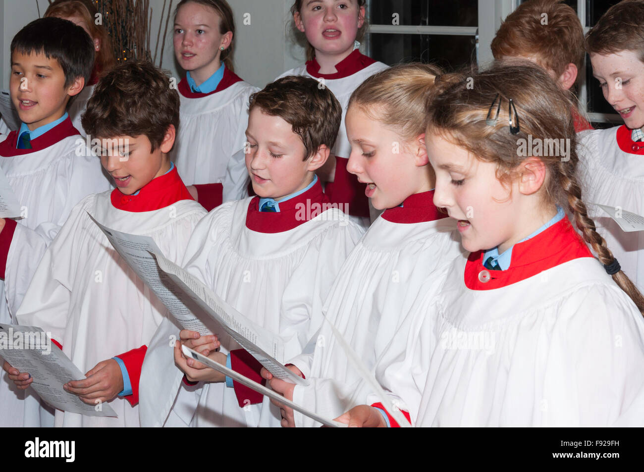 Children's school choir singing Christmas carols, Winkfield Row