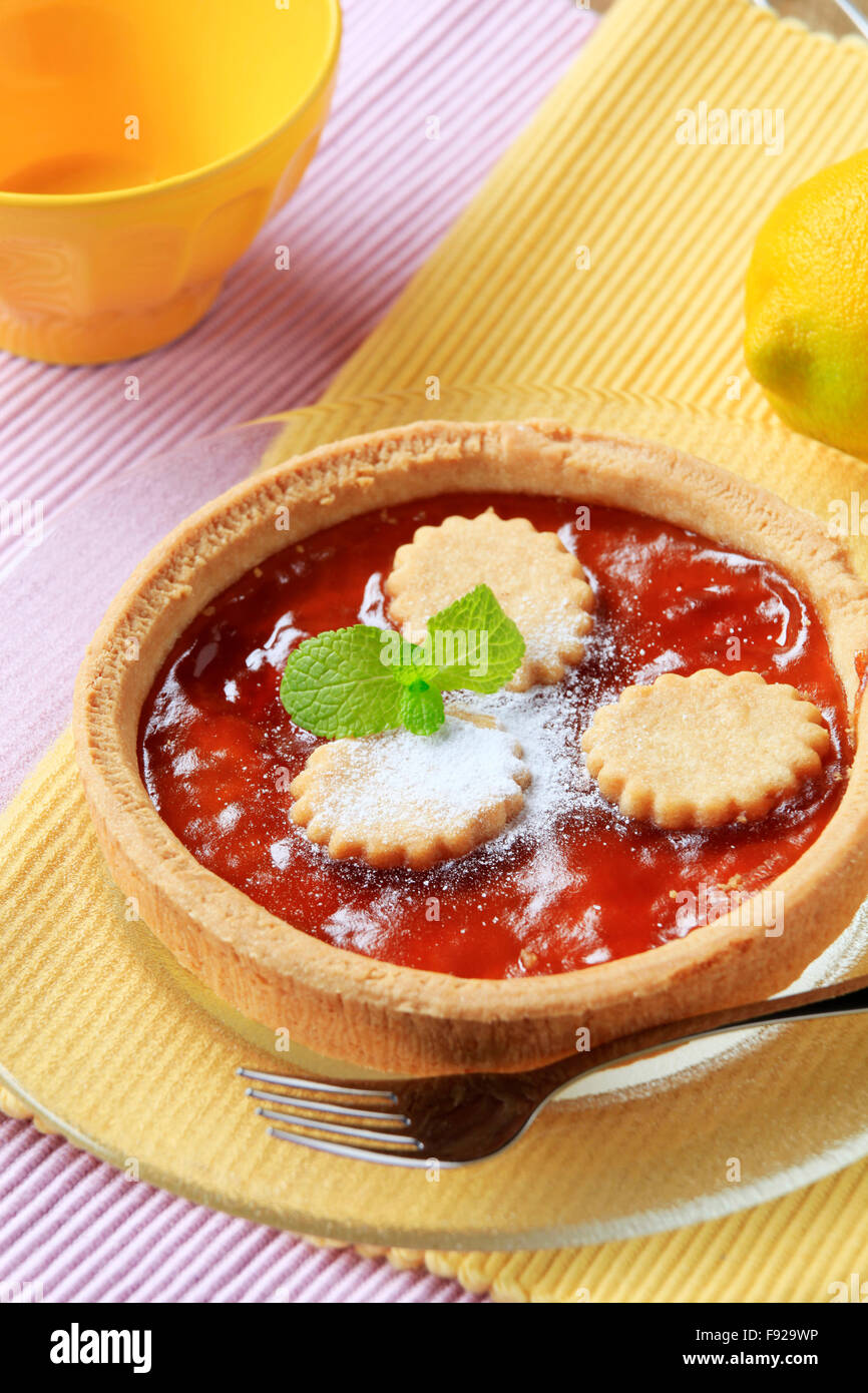 Homemade jam tart sprinkled with sugar - closeup Stock Photo