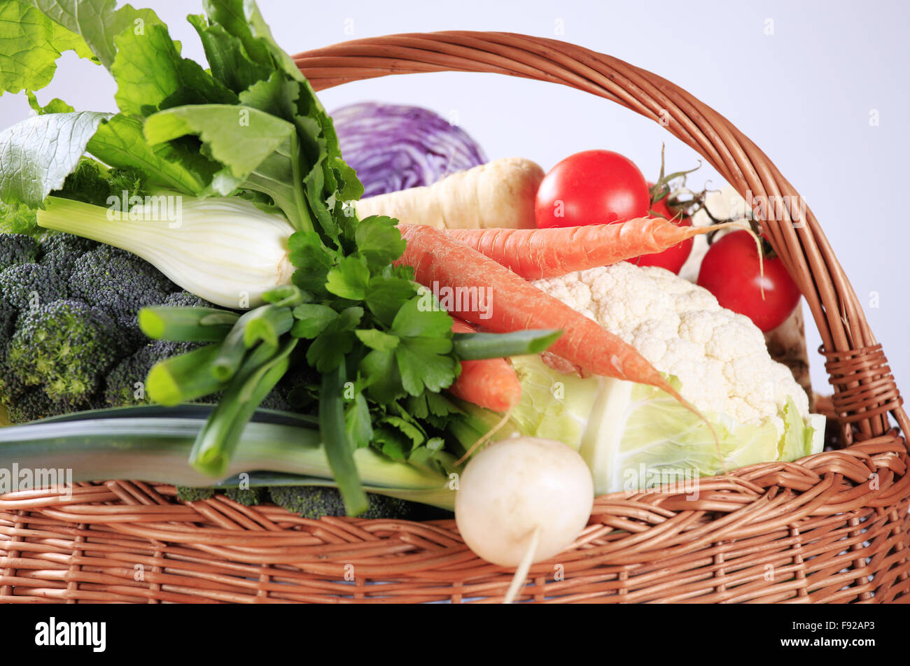 Fresh vegetables in a wicker basket Stock Photo - Alamy
