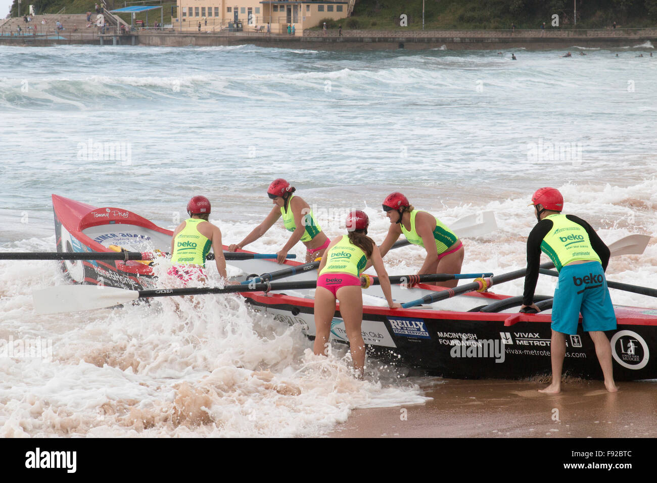 Ocean thunder surfboat racing carnival Dee why beach Sydney, womens girls teams competing,Sydney,australia Stock Photo