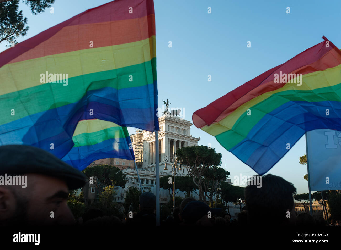 People march for gay and lgbt rights in rome with rainbows flags Stock Photo