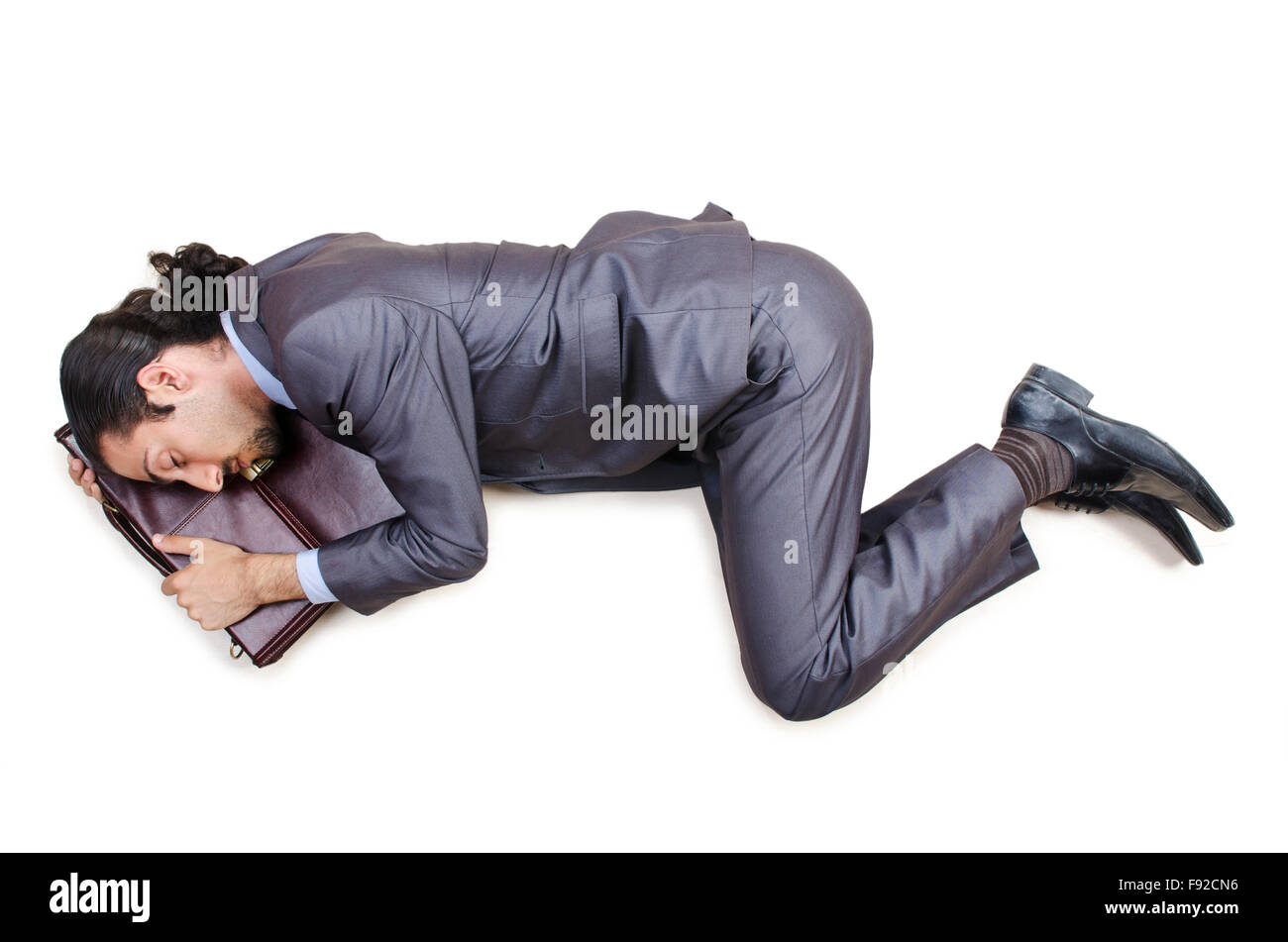 Dead businessman on the floor Stock Photo