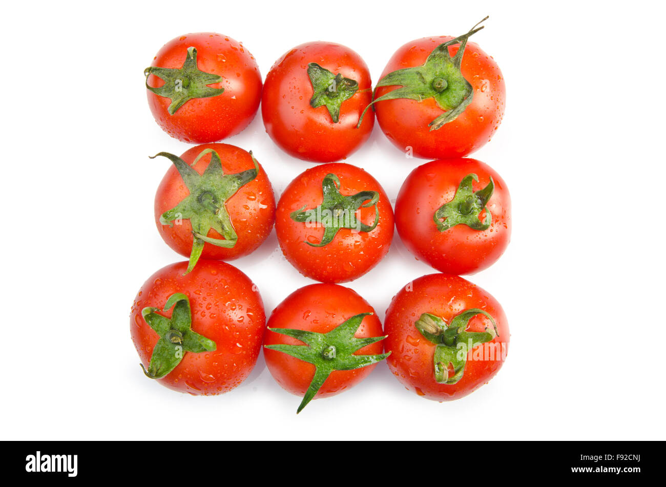 Fresh tomatoes isolated on the white Stock Photo - Alamy