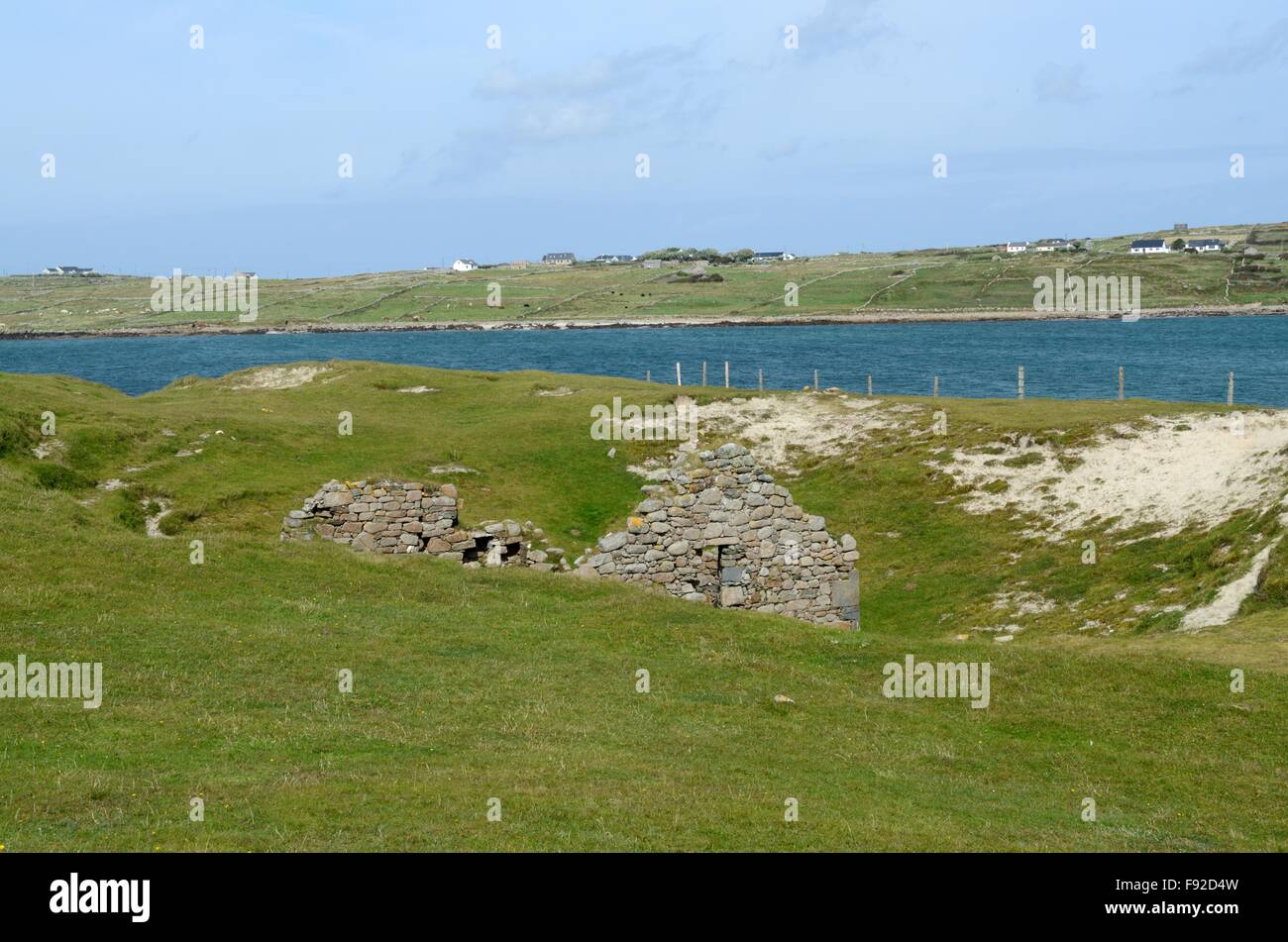 buried medieval Feichins Church Omey island Aughrus peninsula Connemara county Galway ireland Stock Photo