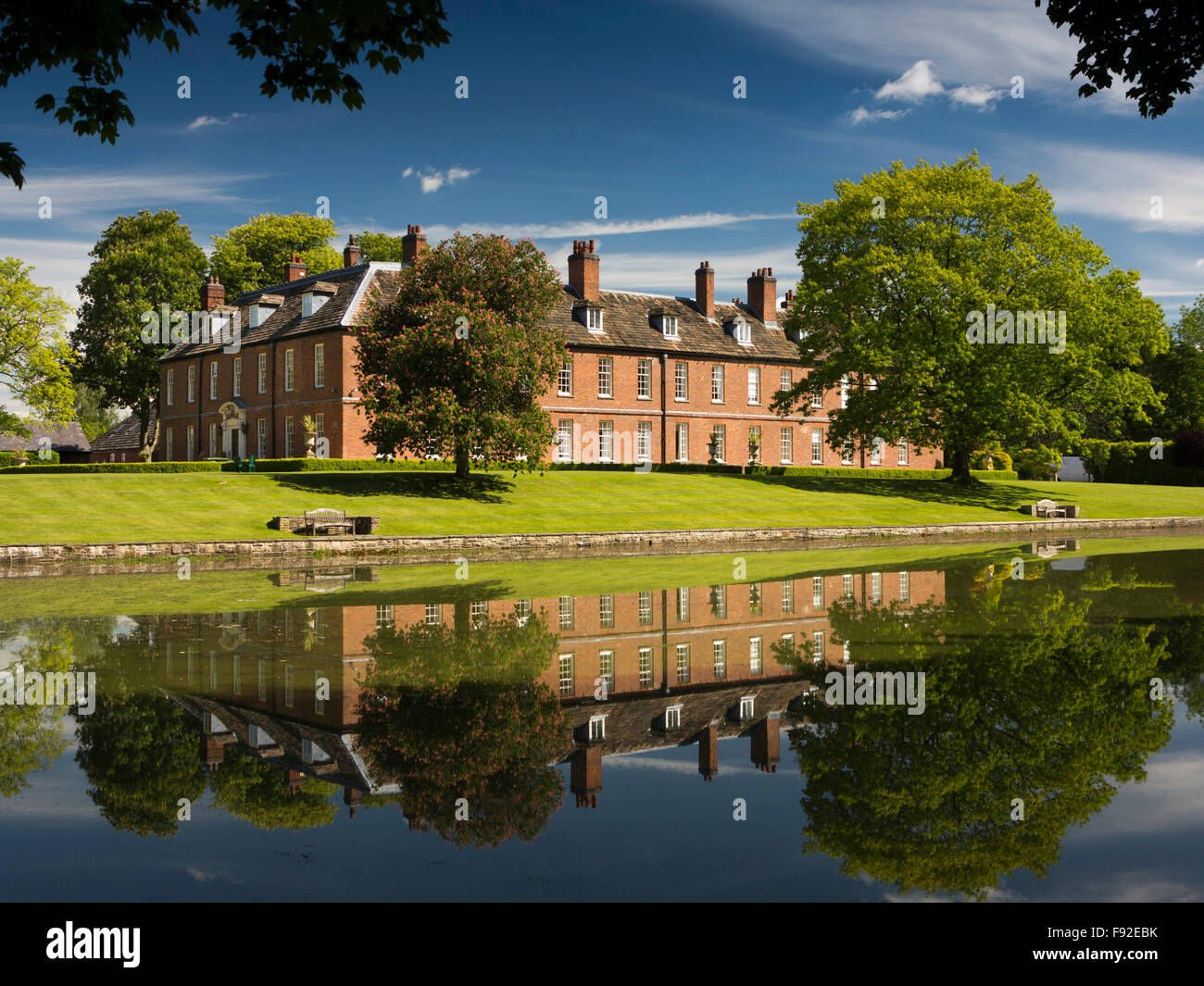 UK, England, Cheshire, Gawsworth, New Hall from across the lake Stock Photo