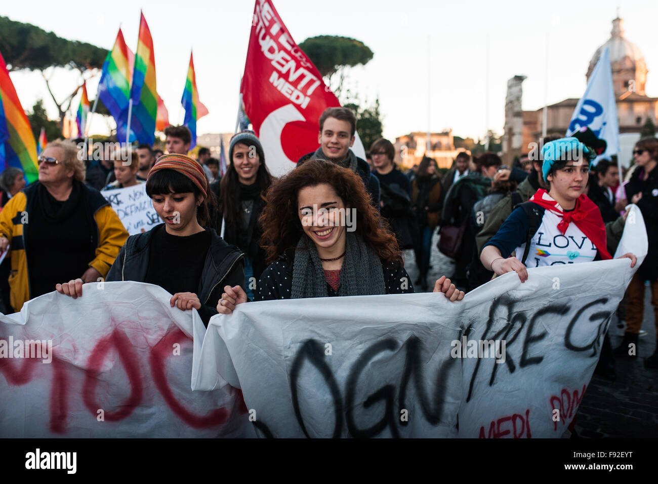 People march for gay and lgbt rights in rome with rainbows flags Stock Photo