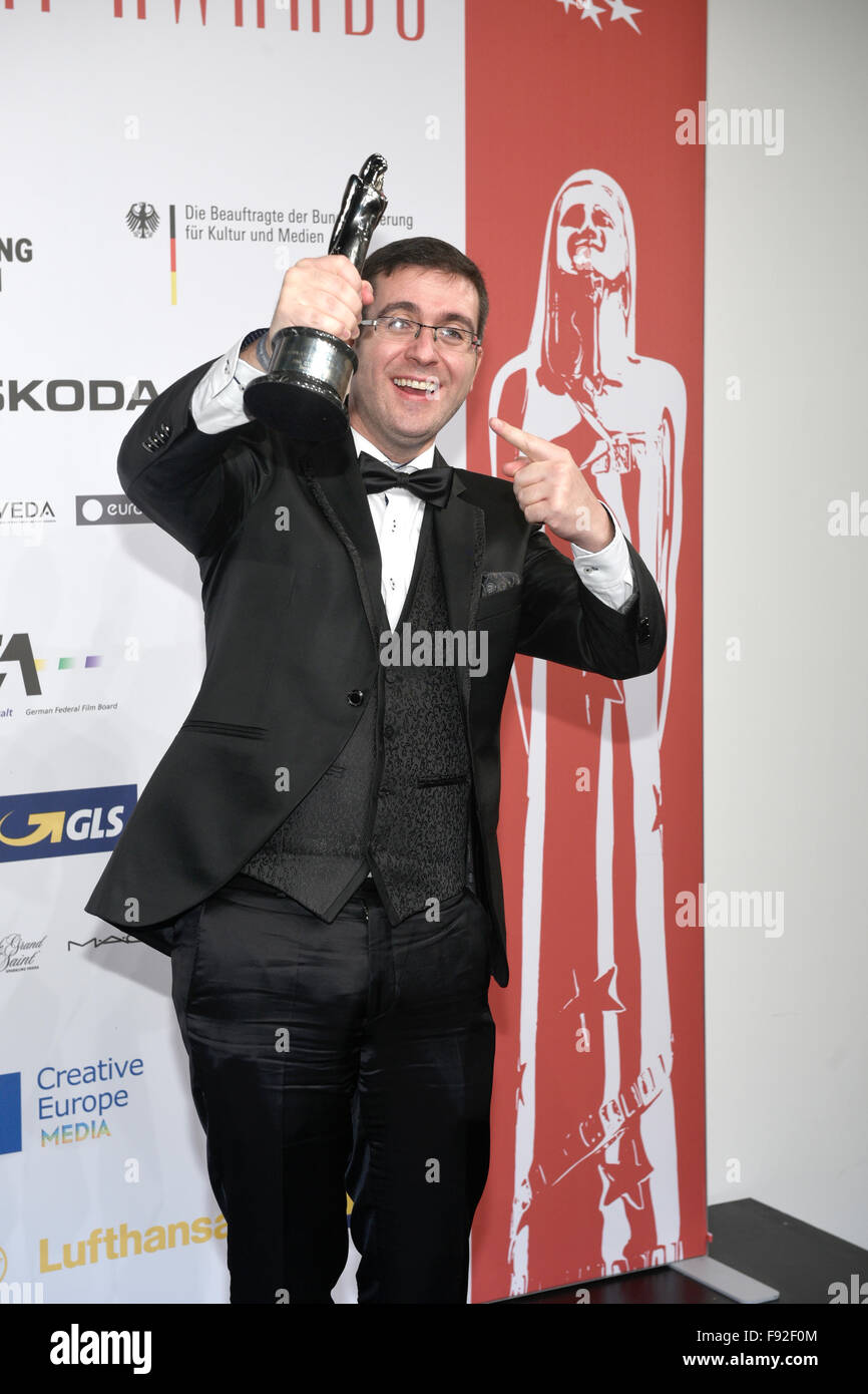 Tomm Moore posing with his award EUROPEAN ANIMATED FEATURE FILM 2015 for 'Song Of The Sea' at the press room after the 28th European Film Award ceremony in Berlin, Germany, late 12 December 2015. Photo: Clemens Bilan/dpa Stock Photo