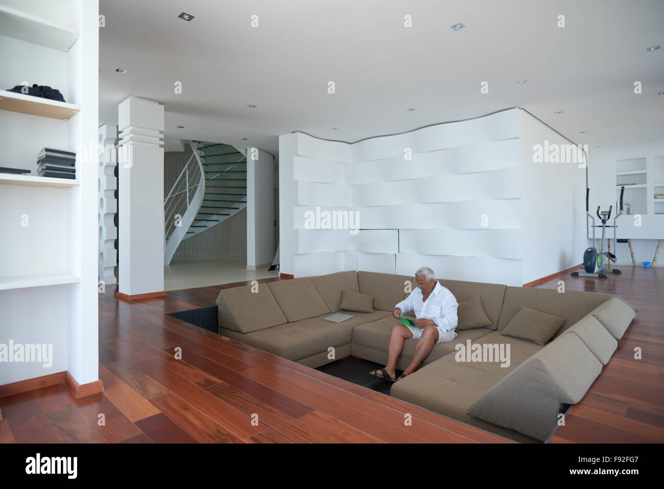 Portrait of senior man relaxing in sofa at home Stock Photo - Alamy