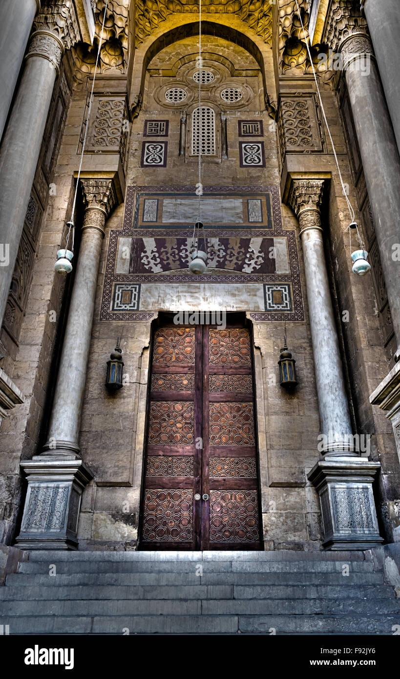 Ornamented wooden door of an old mosque in old Cairo, Egypt, named Royal Mosque dates from around 1361 Stock Photo