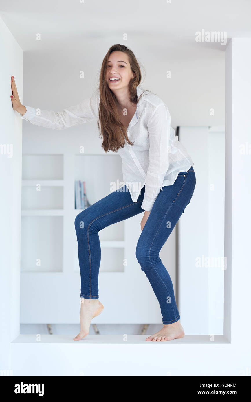 portrait of happy young beautiful woman at home Stock Photo - Alamy