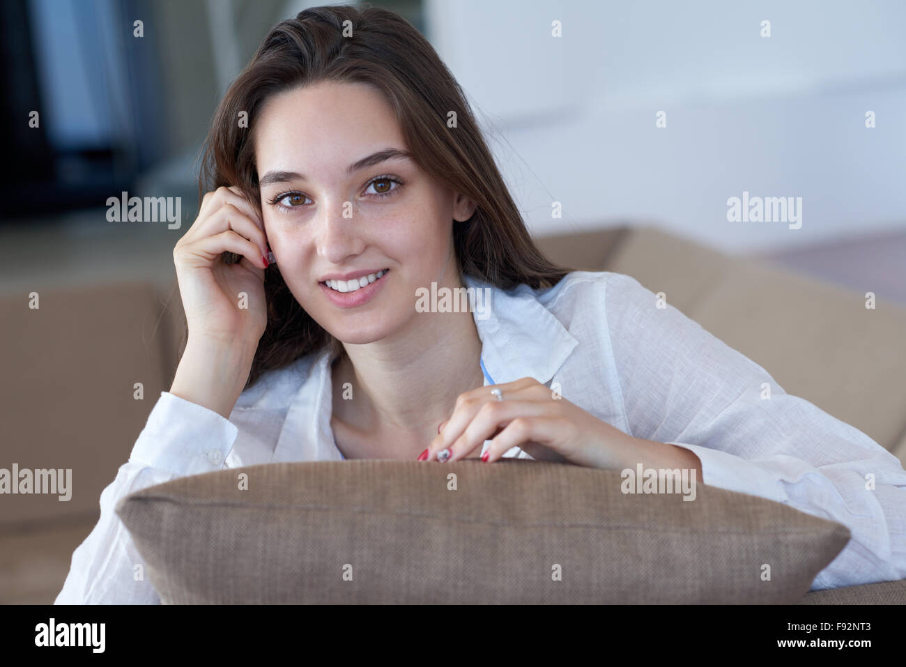 portrait of happy young beautiful woman at home Stock Photo - Alamy