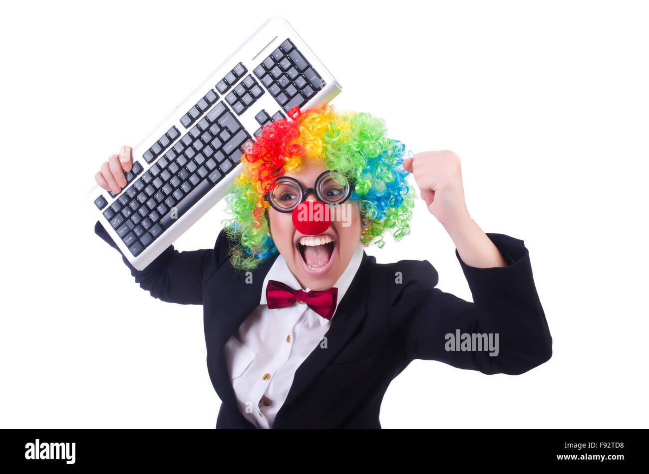 Funny clown with keyboard on white Stock Photo Alamy