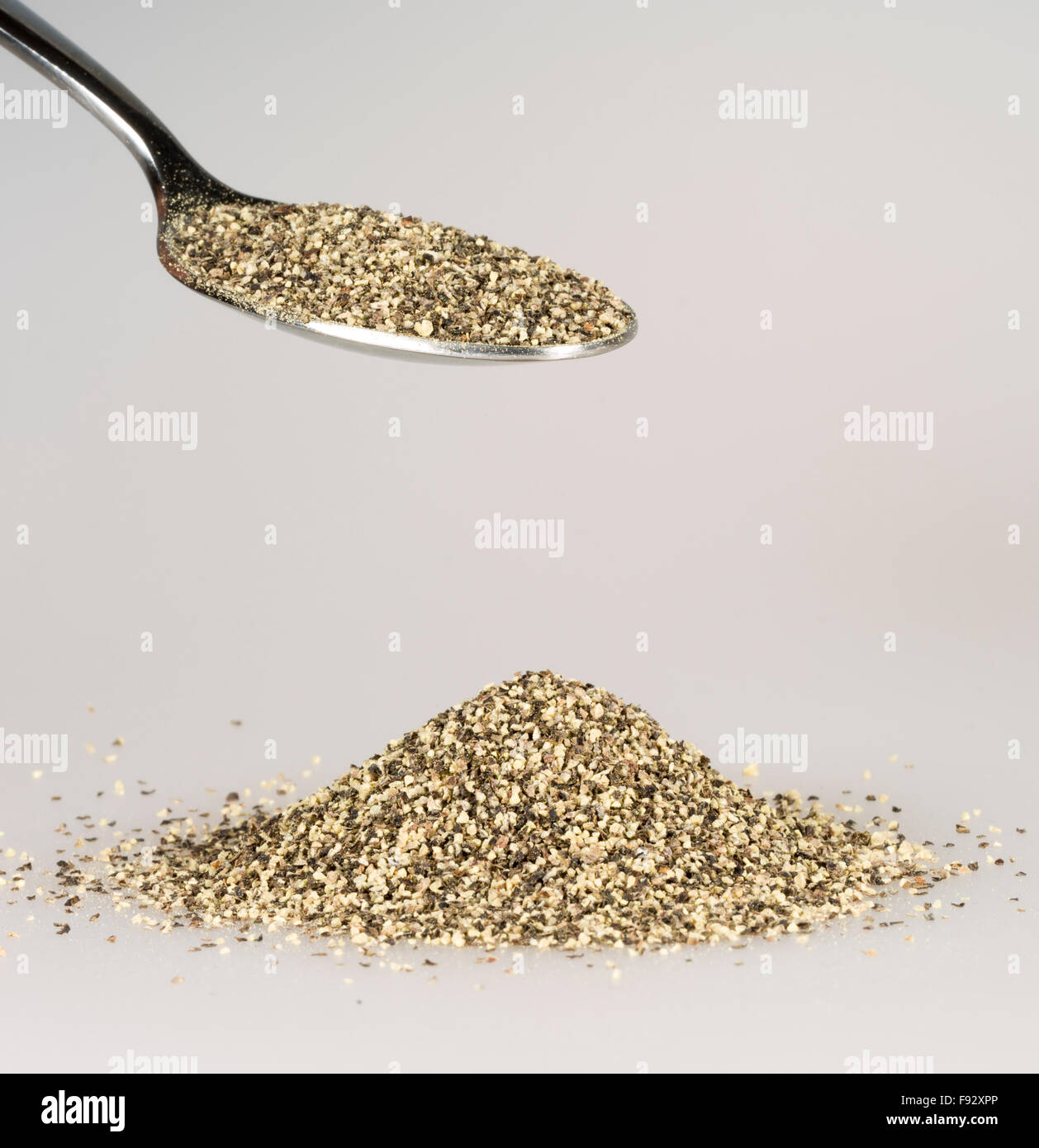 Ground Pepper on Tablespoon Stock Photo