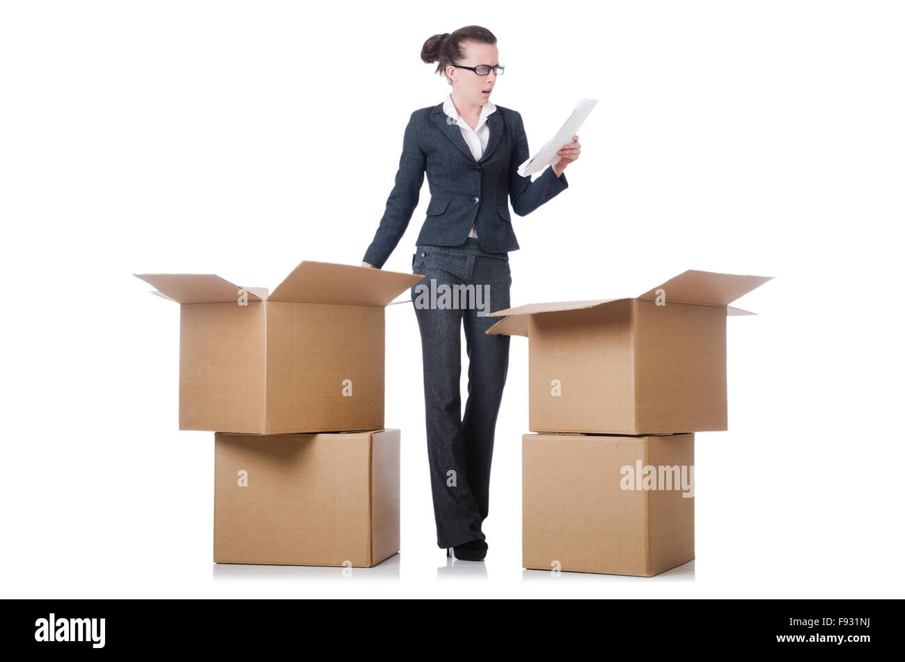 Woman businesswoman with boxes on white Stock Photo - Alamy