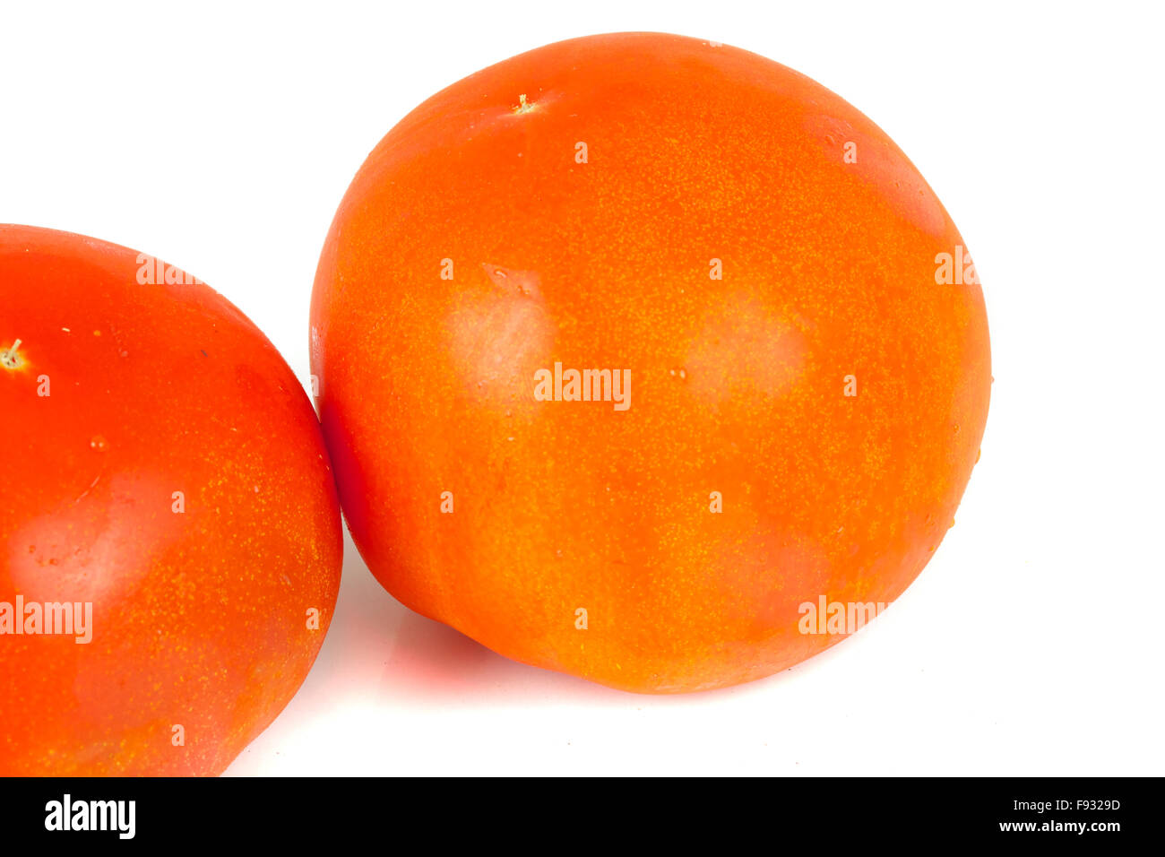 Tomato isolated on white background Stock Photo - Alamy