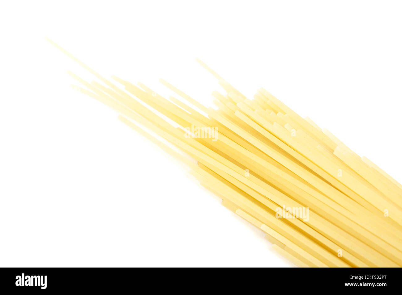 uncooked spaghetti noodles isolated on white background Stock Photo Alamy