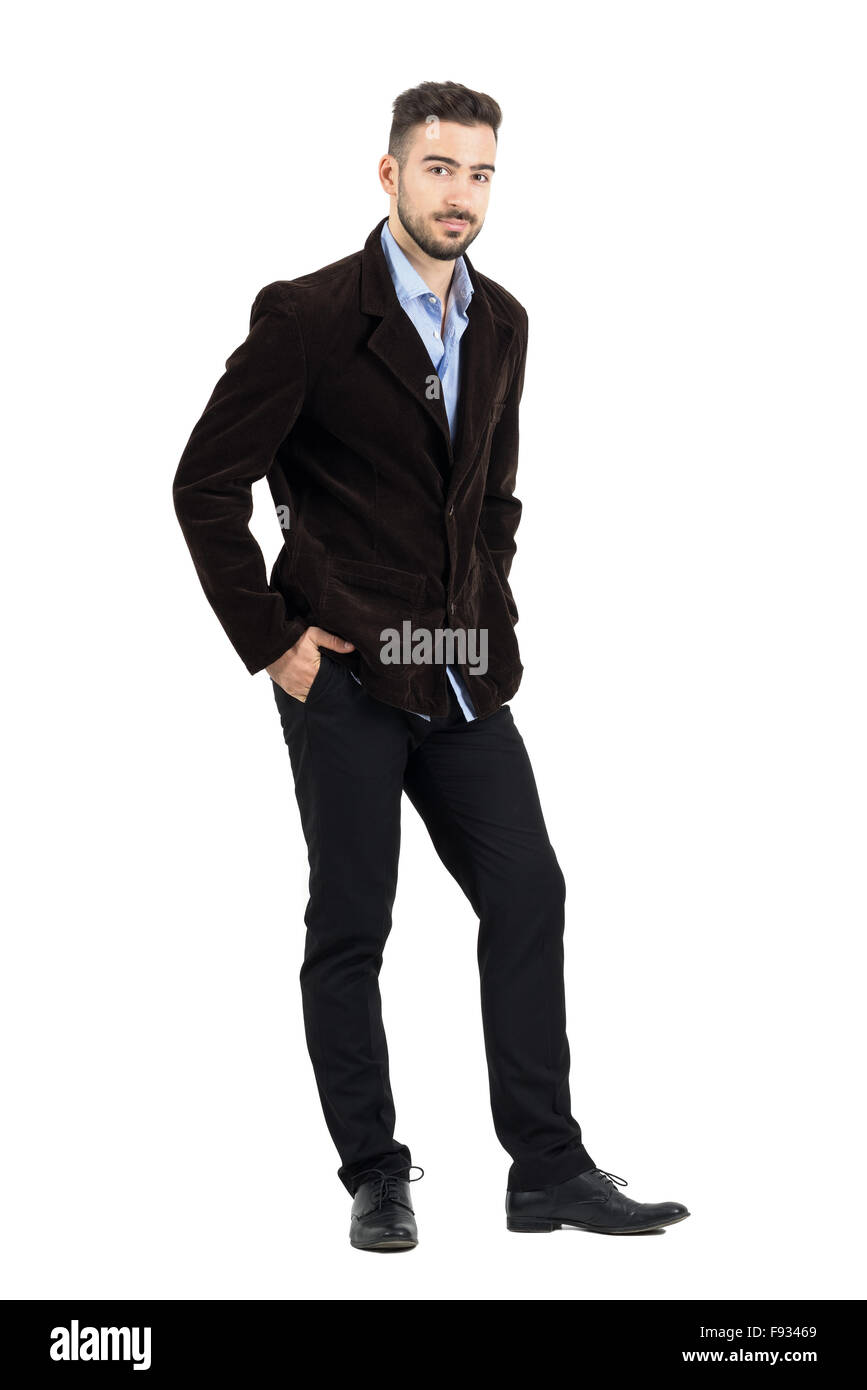 Smiling man in corduroy coat with hands in pocket looking at camera. Full  body length portrait isolated over white background Stock Photo - Alamy