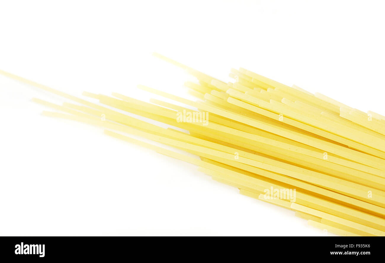 uncooked spaghetti noodles isolated on white background Stock Photo Alamy