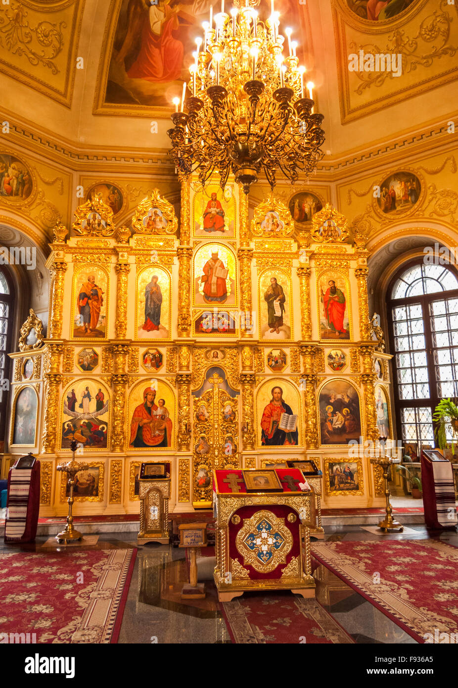 Altar and typically colourful iconostasis in an Orthodox church in Podil, Kiev, Ukraine, eastern Europe Stock Photo