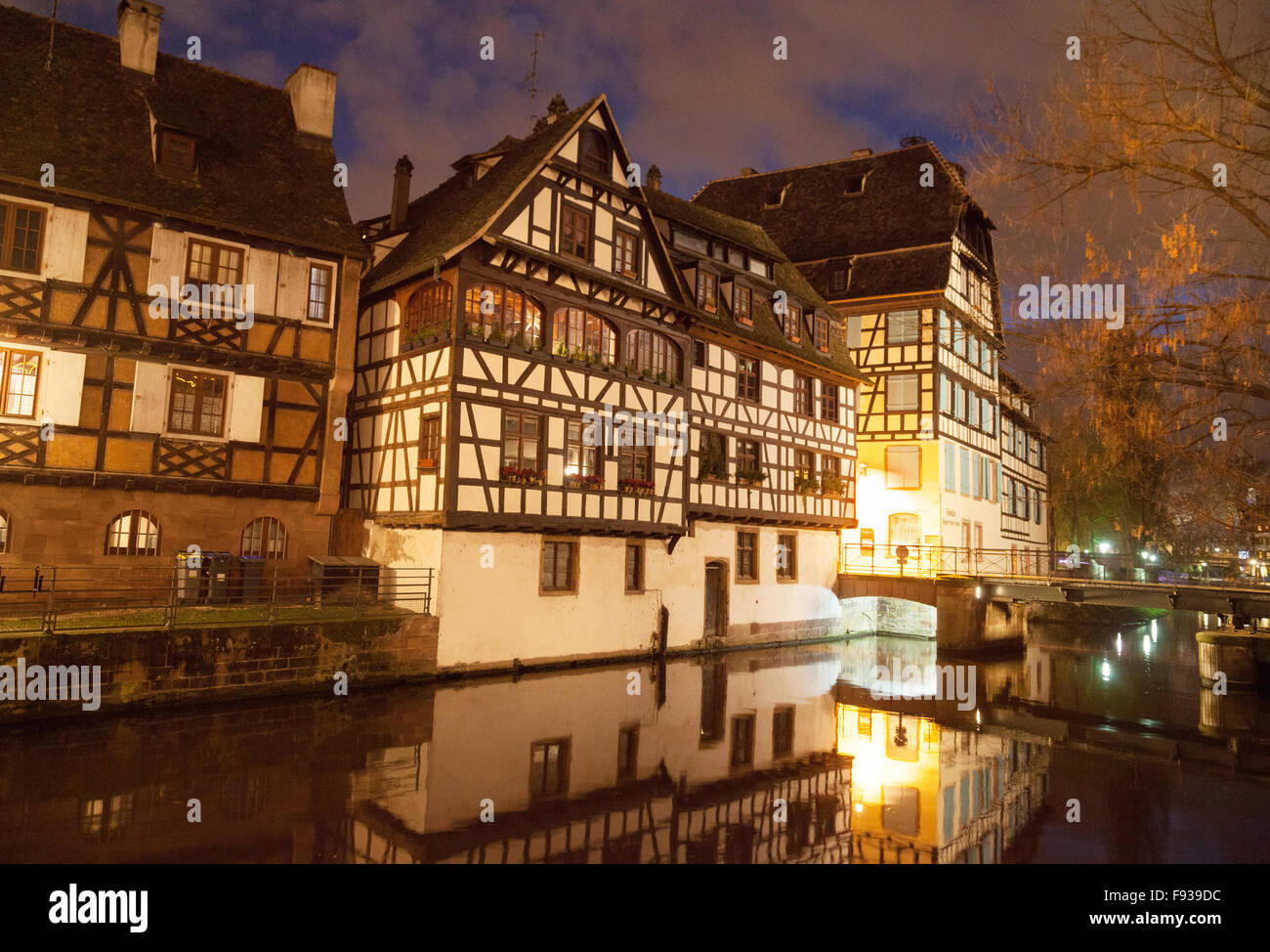 Medieval buildings and the River Ill at dusk, Petite France, Strasbourg old Town, Alsace France Europe Stock Photo