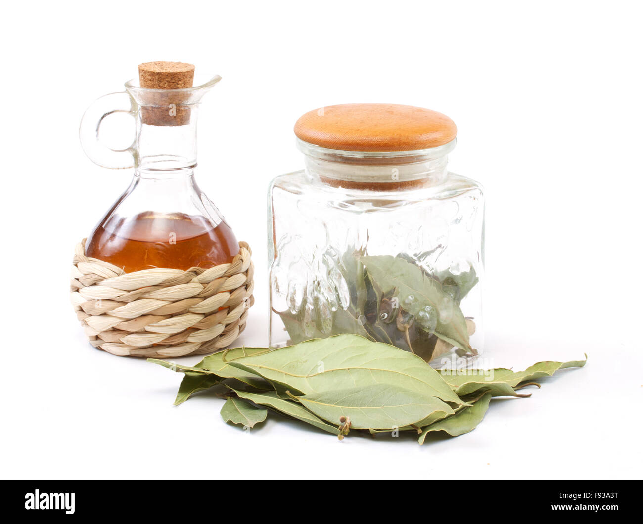 vinegar bottle and laurel leaf on the white Stock Photo Alamy