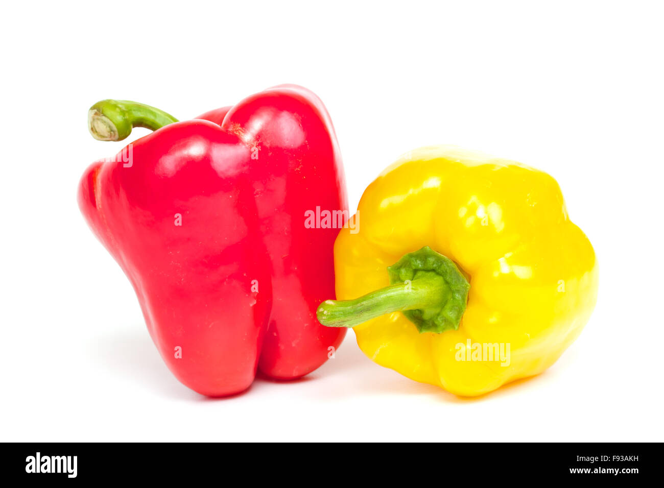 Red and yellow pepper are isolated on a white background Stock Photo ...