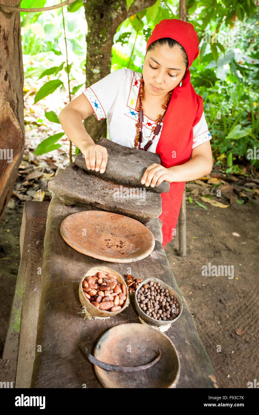 Demonstratio of grinding cocoa beans with pepper and vanilla at the Hacienda Jesus Maria Cocoa plantation near Comalcalco, Tabas Stock Photo